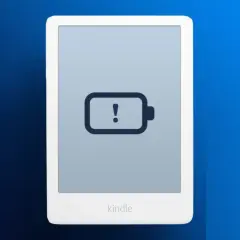Écran de Kindle affichant une icône de batterie vide avec un point d'exclamation. Ma Kindle ne charge plus, c'est frustrant !