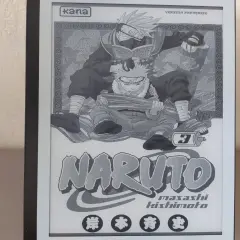 Un **manga sur liseuse** affiche la couverture du tome 3 de Naruto, avec Kakashi lisant par-dessus Naruto.