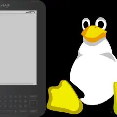 Un e-reader avec un clavier ressemble à un Tux, le pingouin de Linux, prêt à lire.