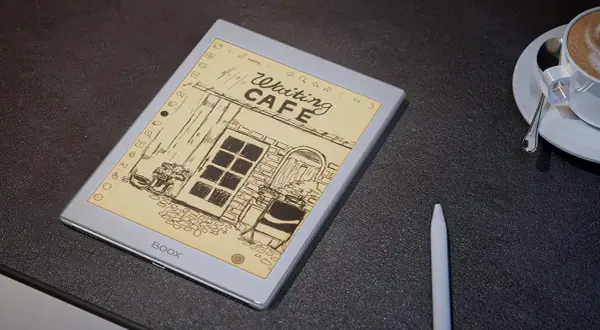 Une liseuse BOOX affiche un dessin de café, parfait pour lire vos nextory sur liseuse.