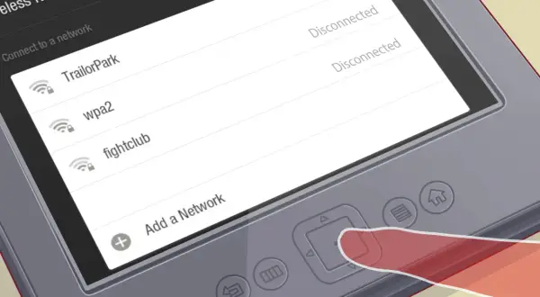 Un doigt appuie sur un bouton d'un appareil affichant les réseaux Wi-Fi disponibles, prêt à envoyer vers Kindle.