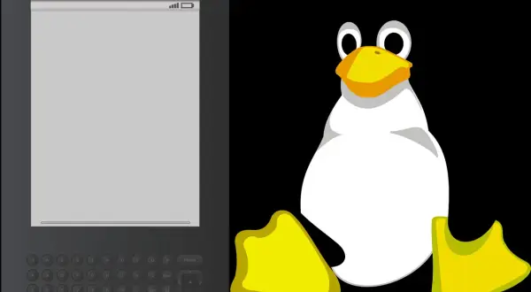 Un e-reader avec un clavier ressemble à un Tux, le pingouin de Linux, prêt à lire.